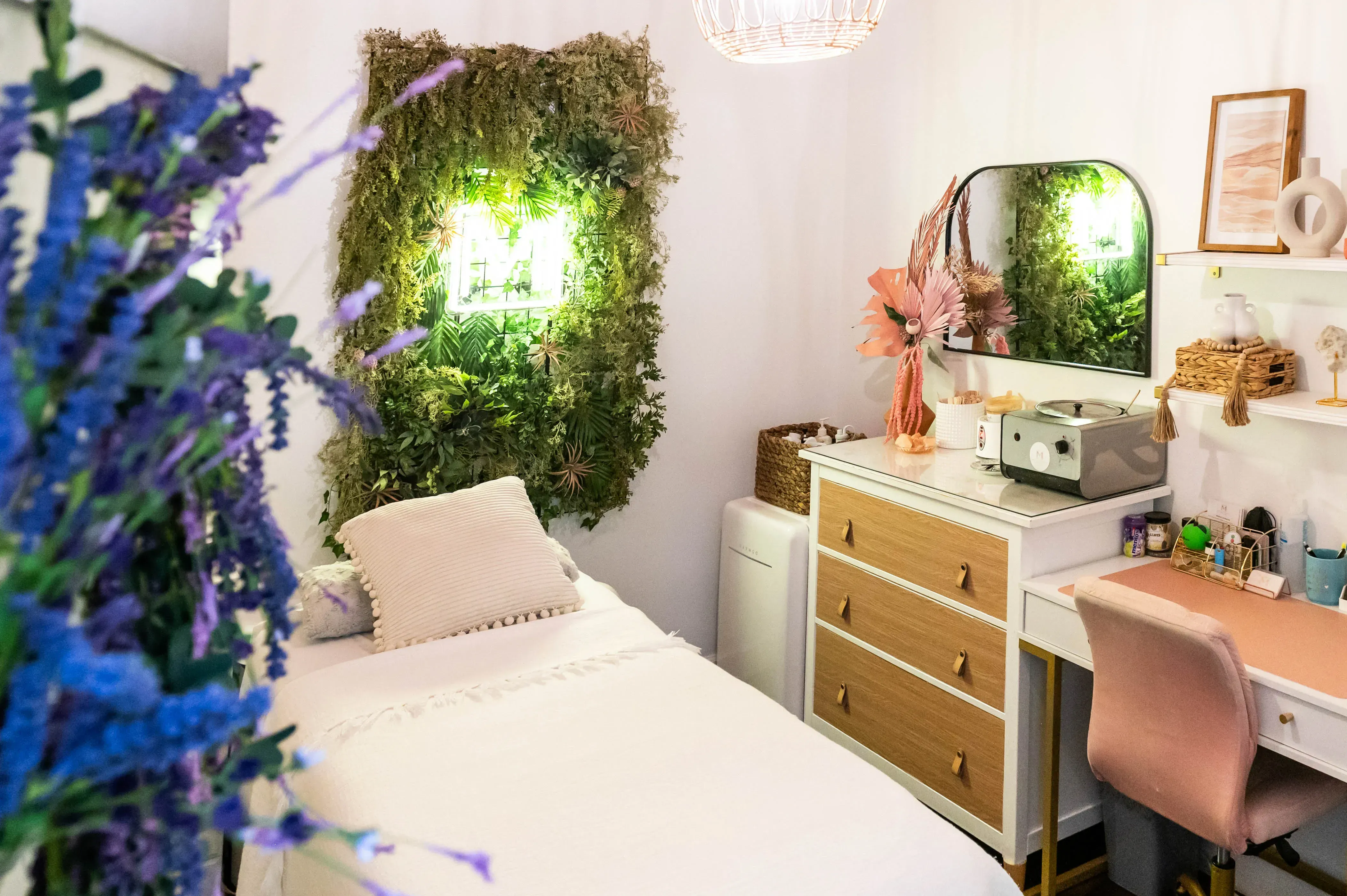 A bright Salons by JC salon suite location with well-appointed styling stations for independent beauty professionals