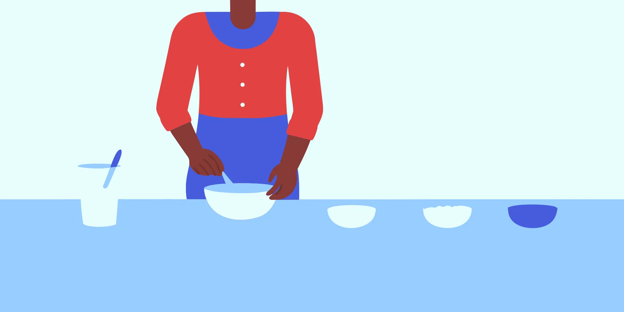 Woman over 60 mixing MCT oil powder into a morning drink