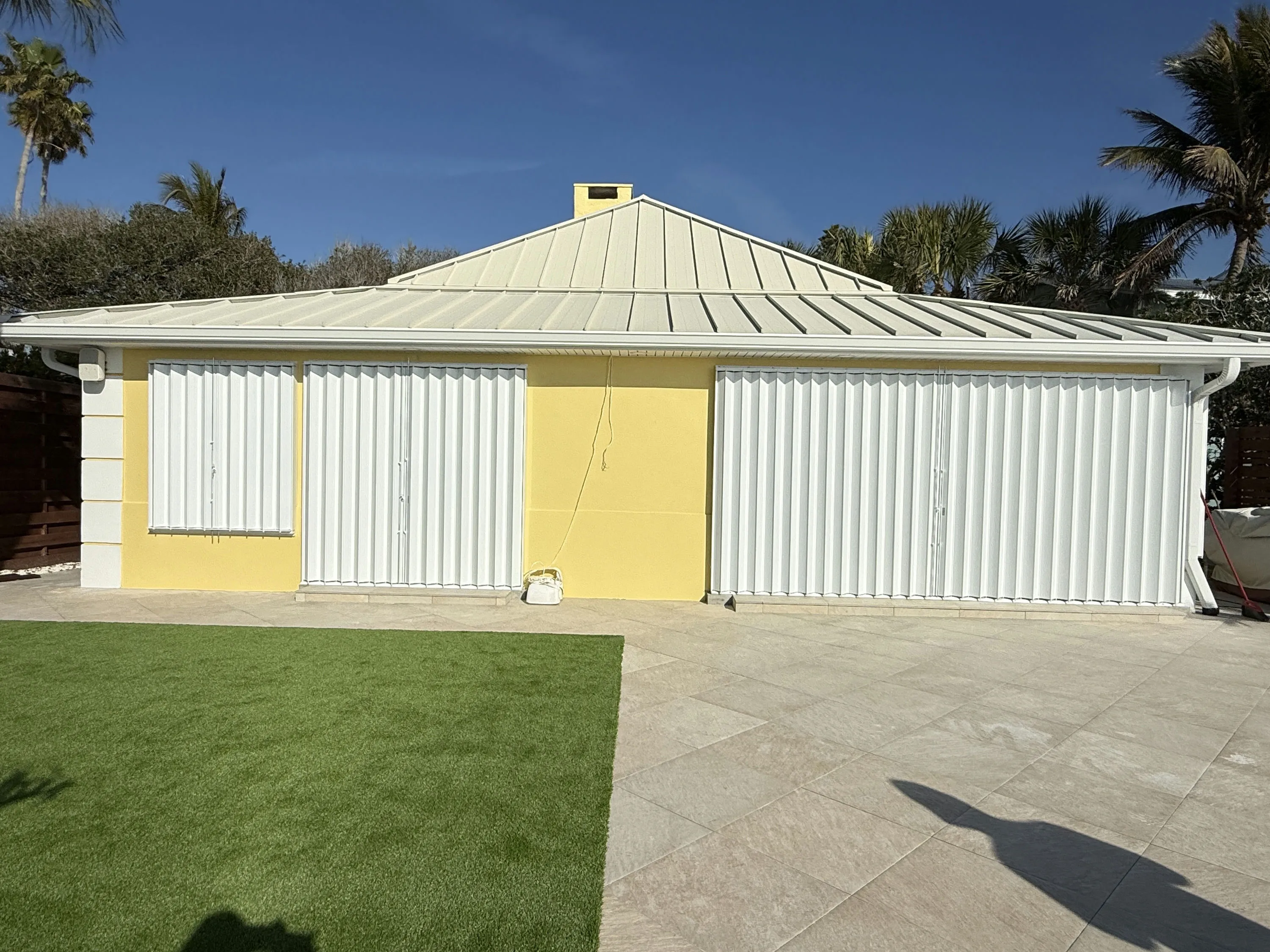 Accordion shutters installed on a Sarasota home