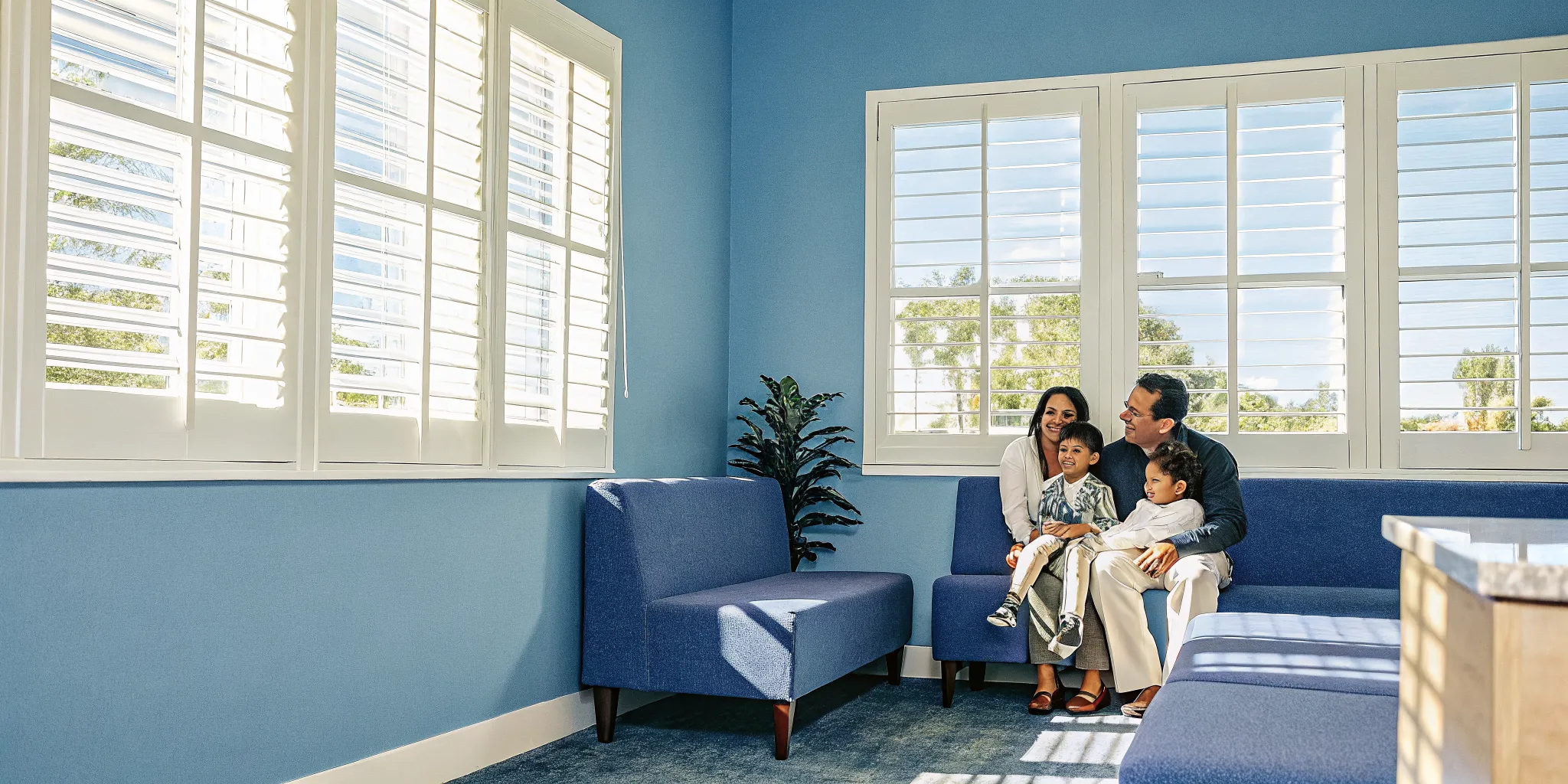 Happy family at a West Melbourne dentist office for their dental checkup