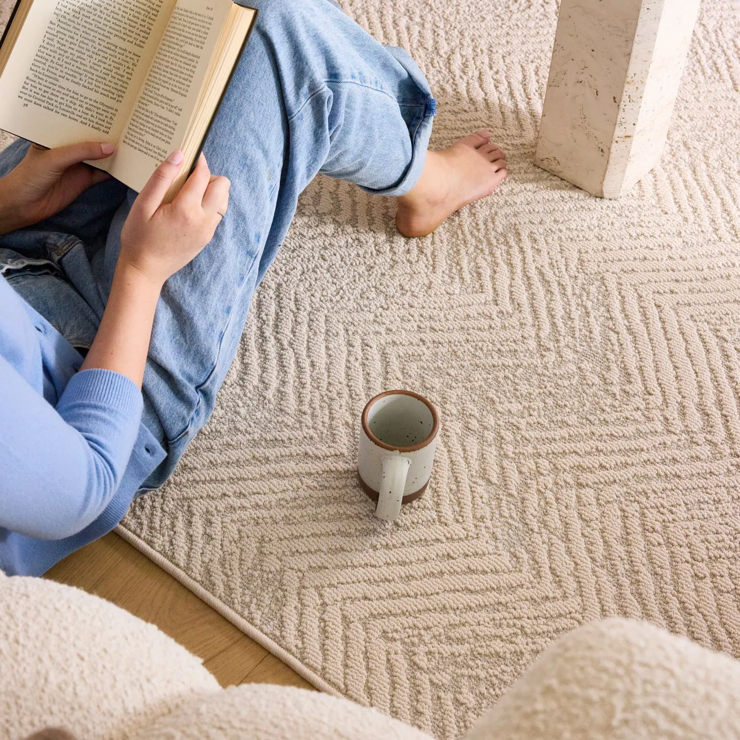 Spill on a neutral Groundstory Elementa performance rug