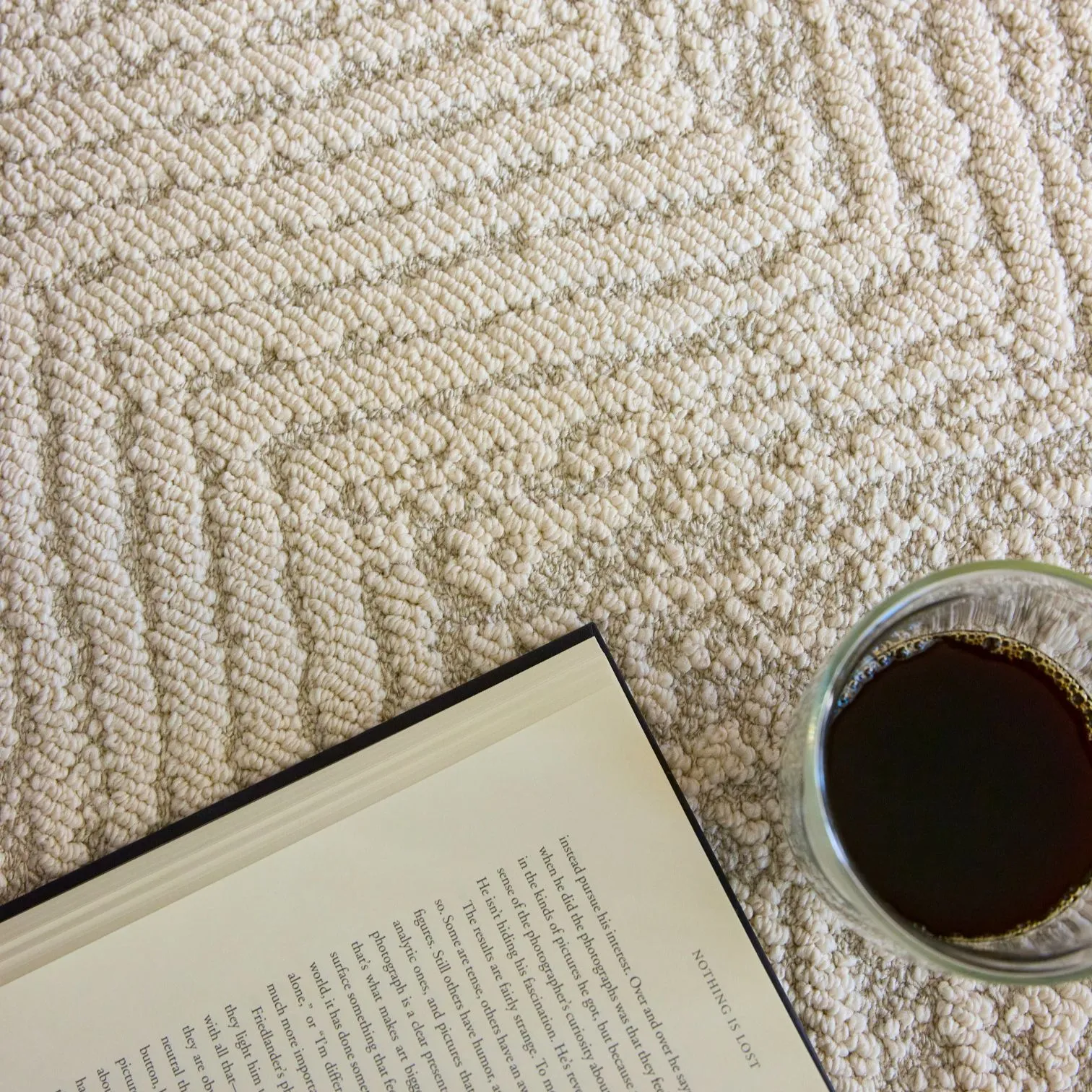 Close-up texture of a neutral wool blend area rug