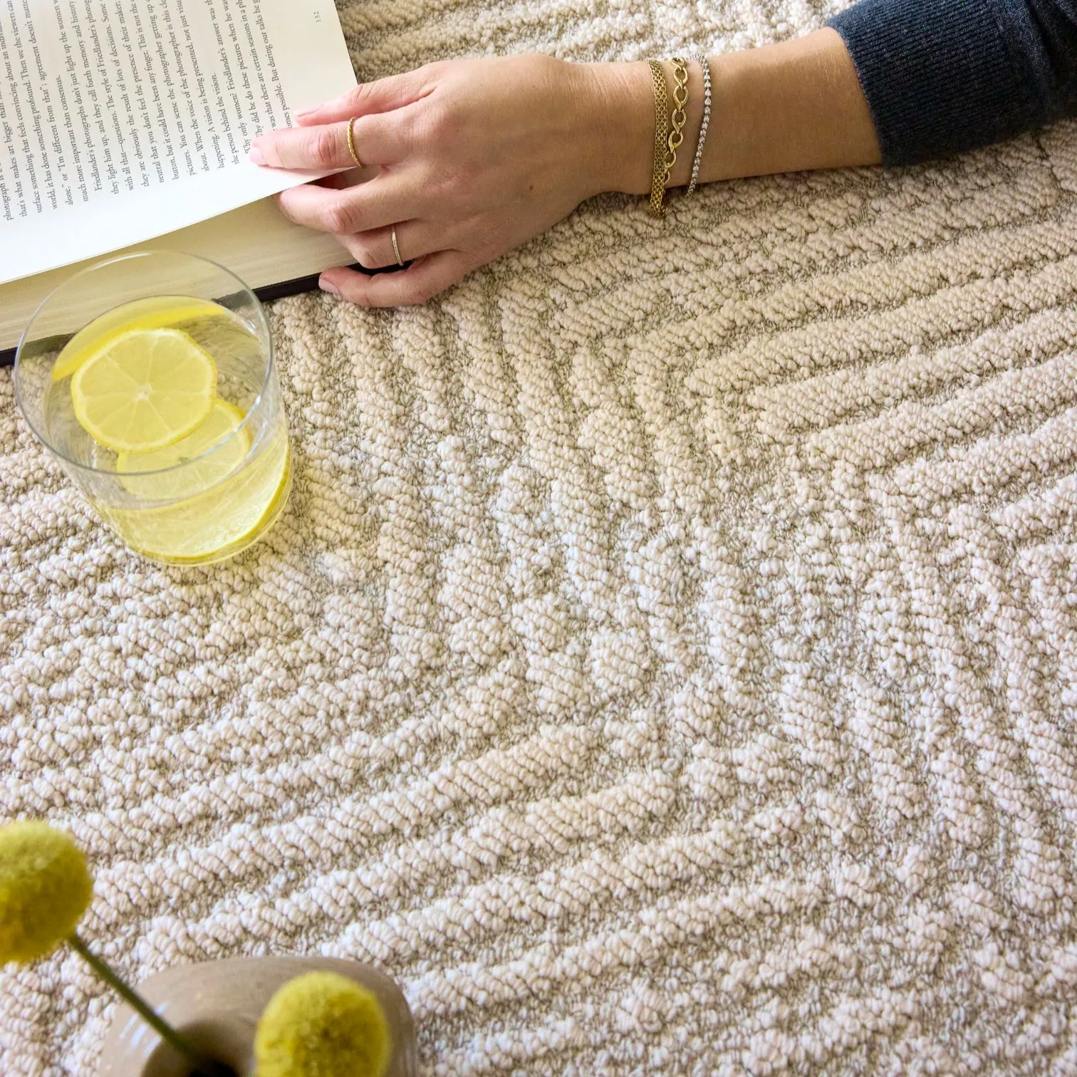 Neutral rug weave showing soft texture and subtle color variation