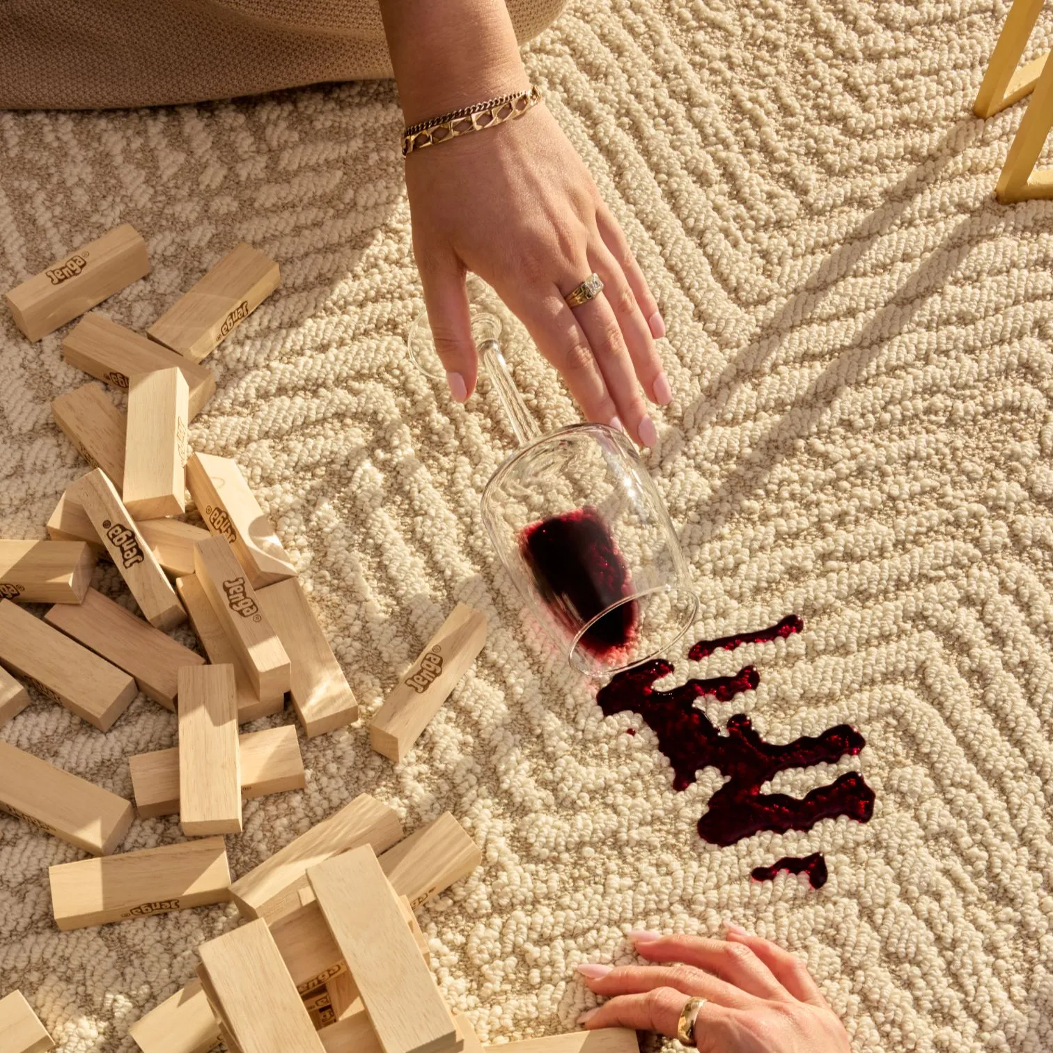 Family playing games on a performance rug - Groundstory Elementa collection
