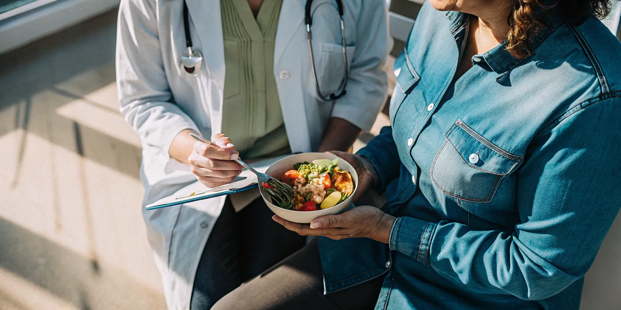 Patient discussing nutrition coaching for weight loss in Tampa with a clinical provider