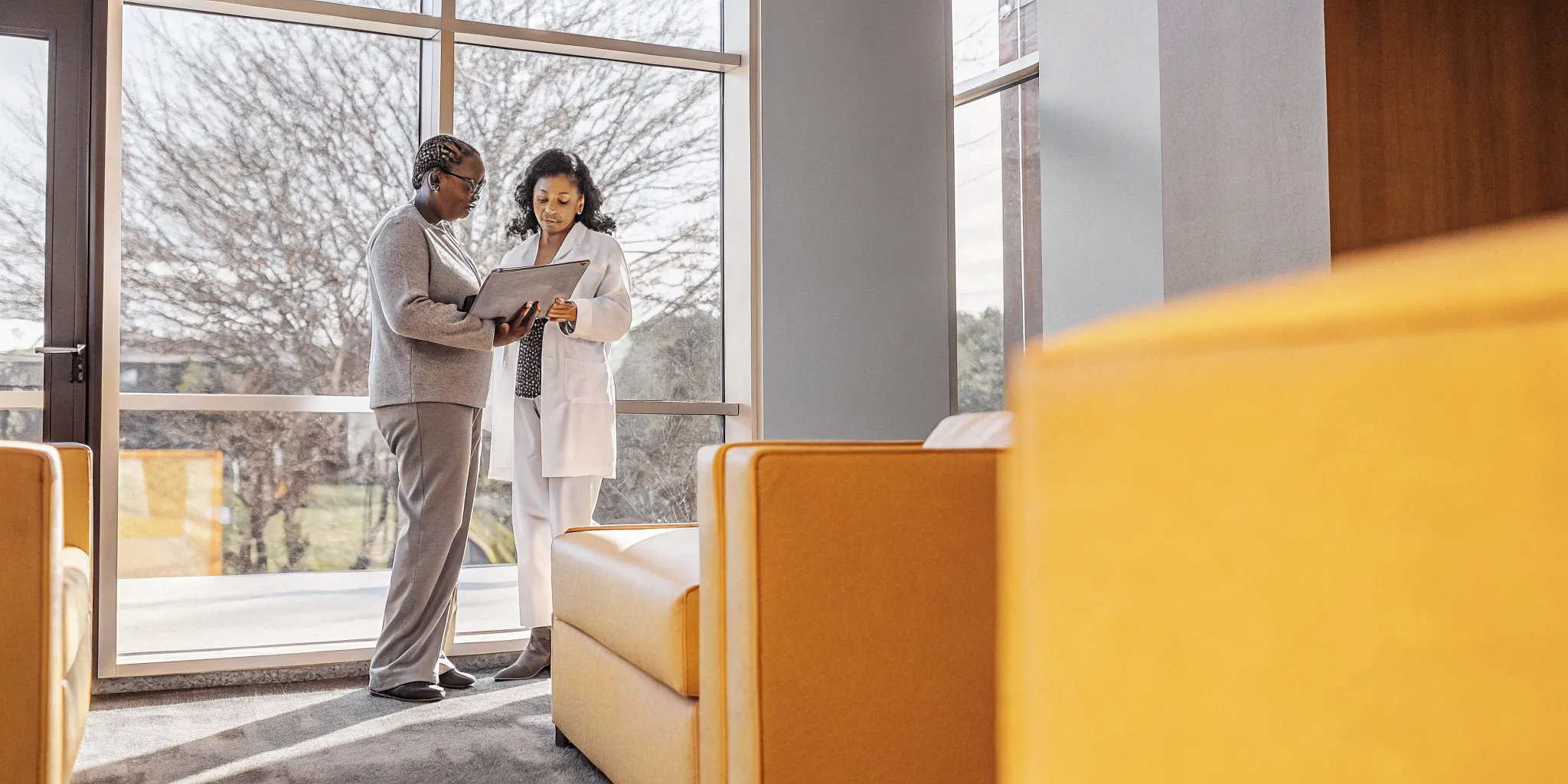 Physician and patient reviewing a personalized weight loss consultation plan in Tampa