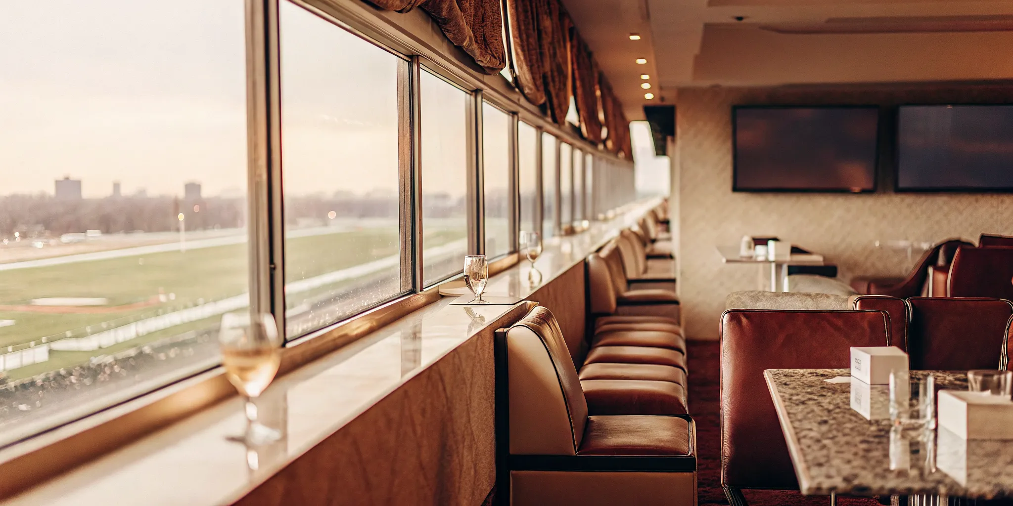 Luxury VIP hospitality suite at Belmont Park with private dining and track views