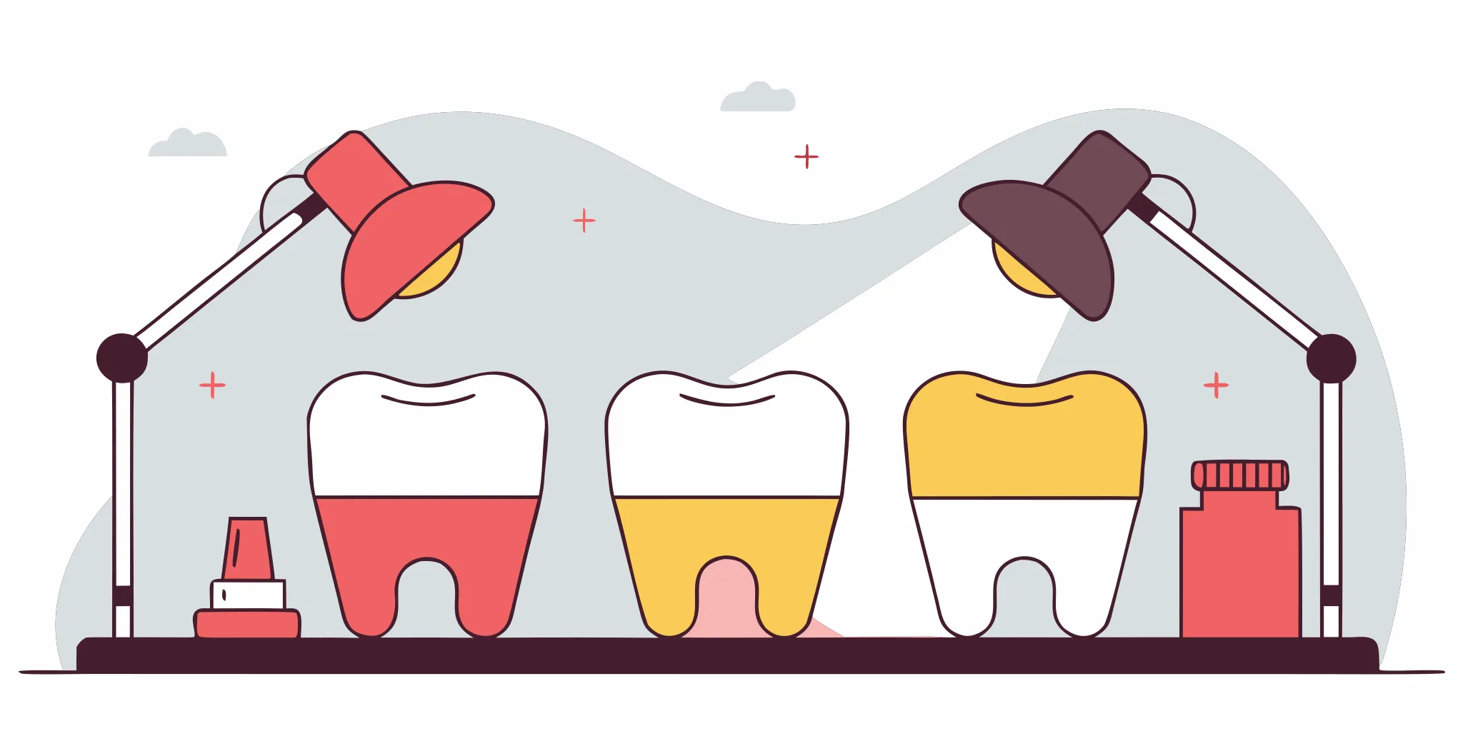Side-by-side comparison of zirconia, lithium disilicate, and feldspathic dental ceramic crowns on a laboratory workbench