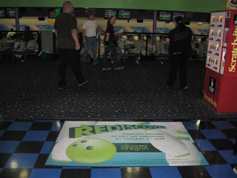 Bowling alley advertising placement near lanes and seating areas