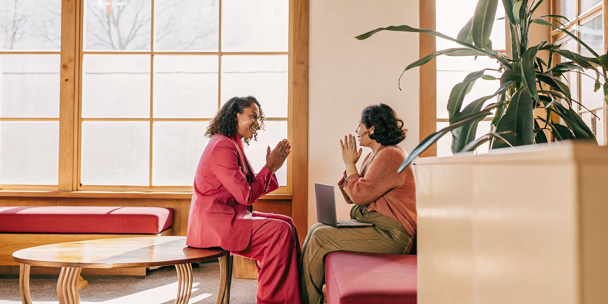 Small business owner comparing financing paths with a specialist