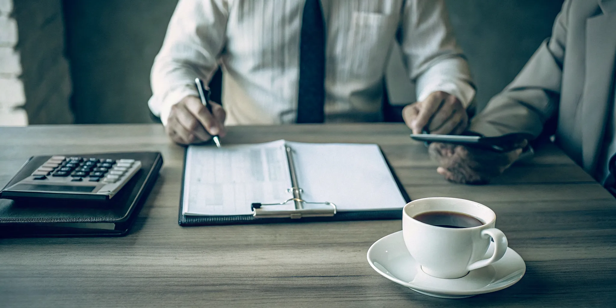 Trust documents on a desk representing responsible financial management and asset protection