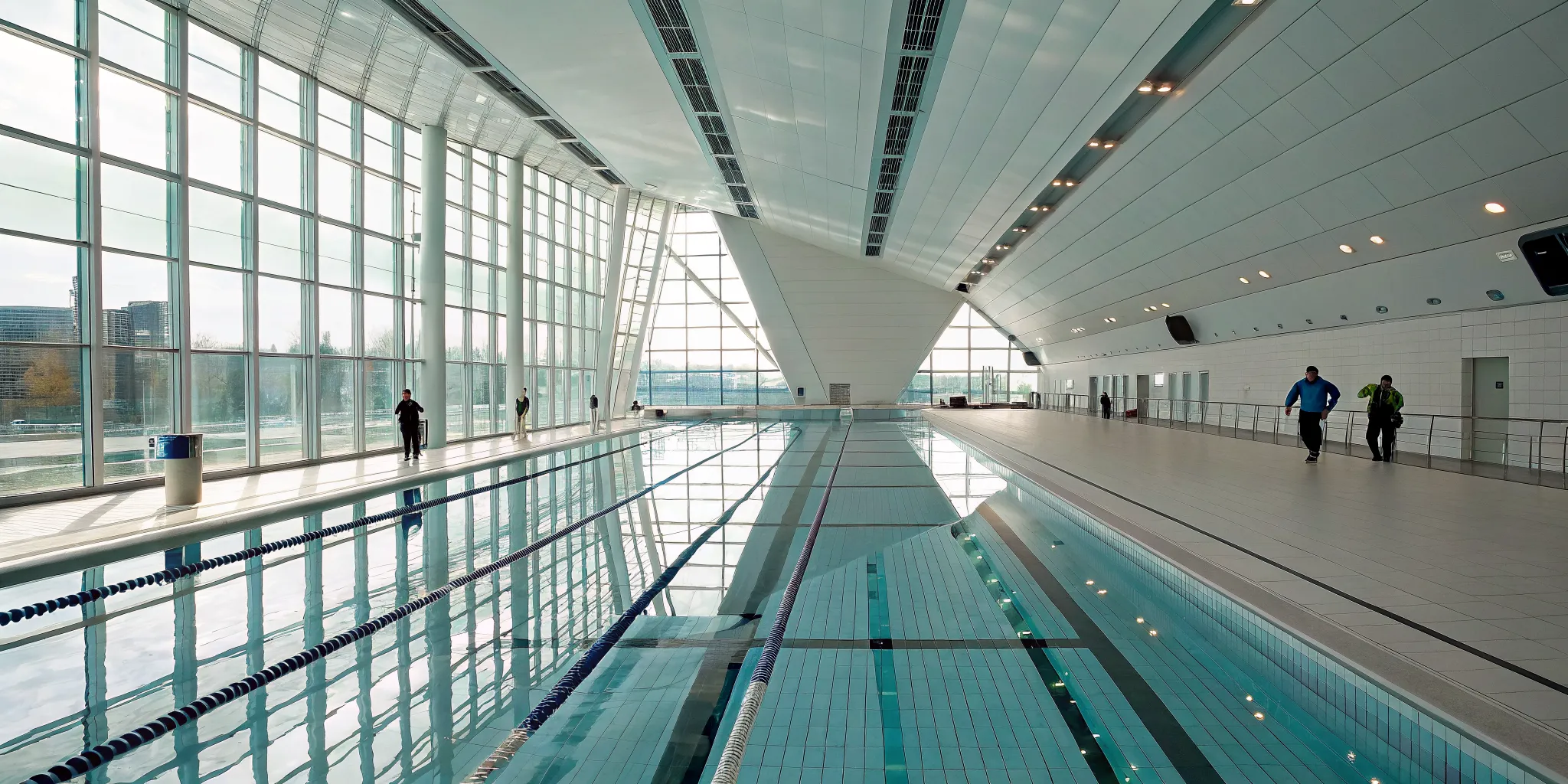 Modern indoor swimming pool using an automated swimmer monitoring system.