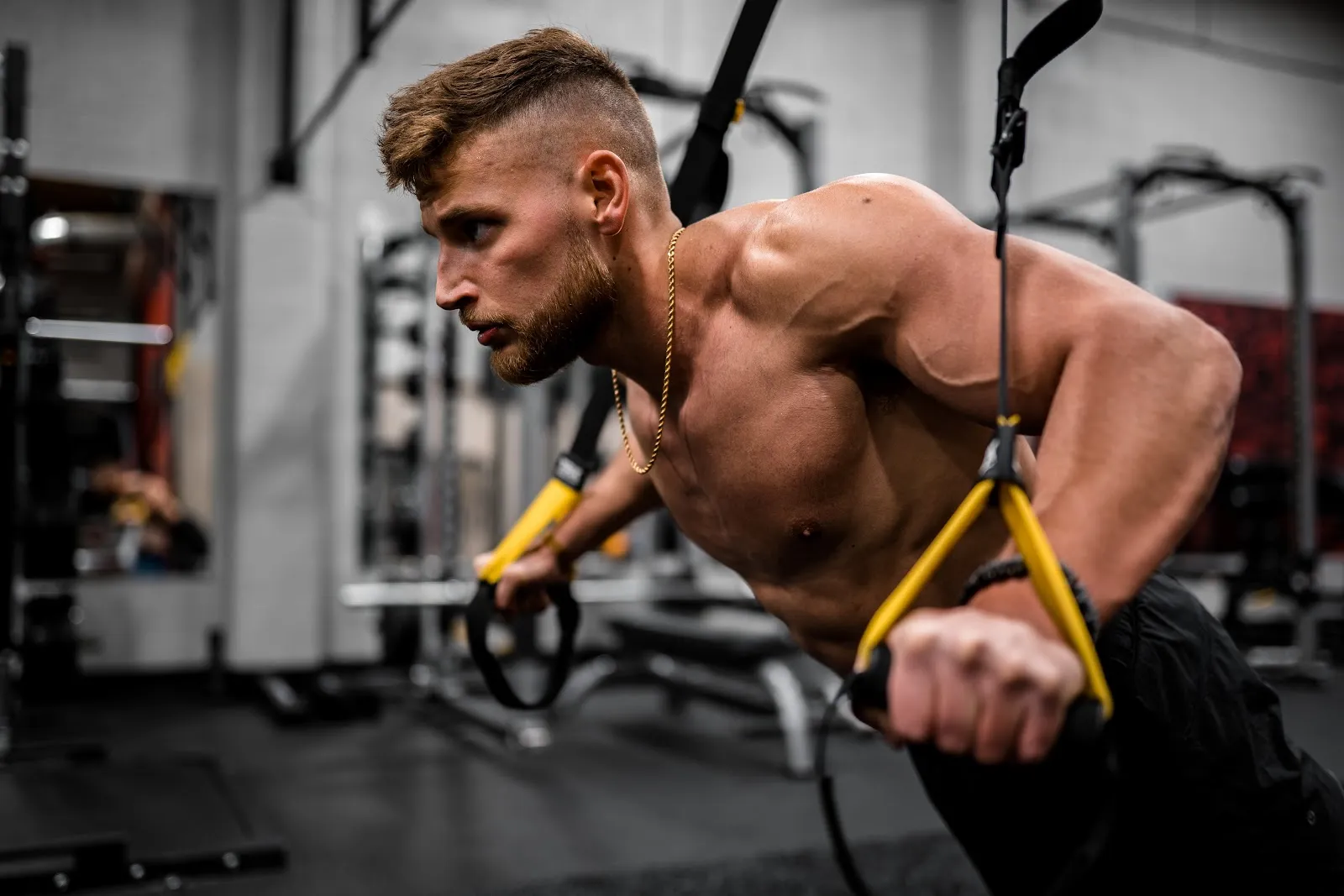 CBD recovery products including roll-on and kinesiology tape arranged for an athlete's post-workout routine