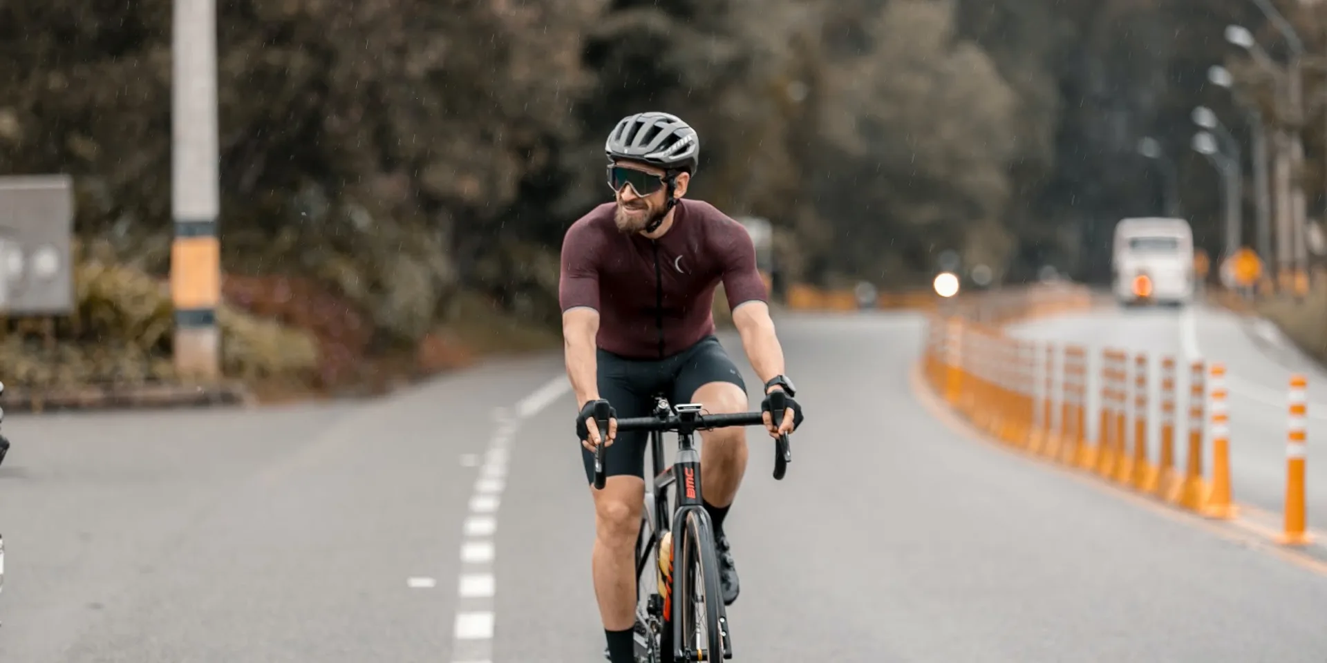 Athlete performing gentle active recovery movement outdoors