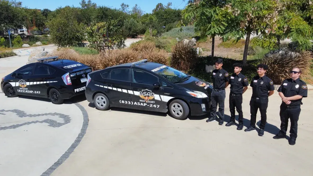 Church leaders and a security professional reviewing an entrance during a site walkthrough