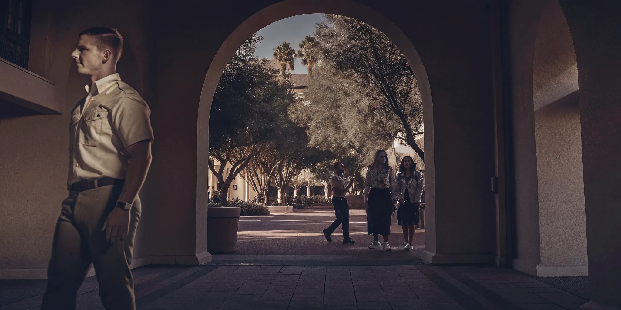 School security guard managing safe student arrival and campus traffic