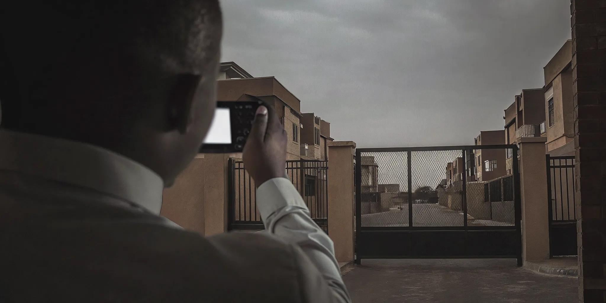 Security patrol officer documenting a multi-site property inspection