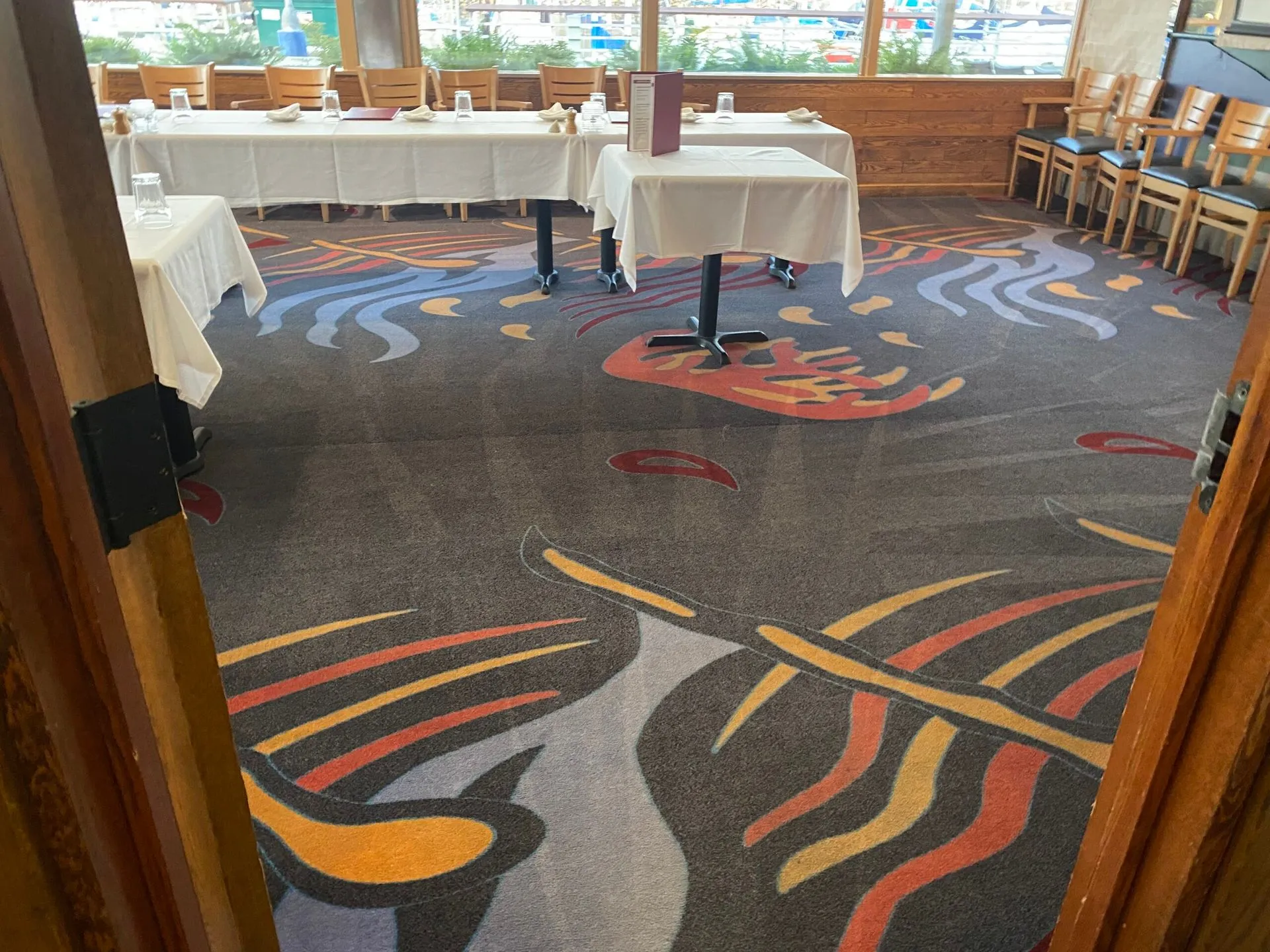 Technician steam cleaning carpet in Maple Valley, Washington