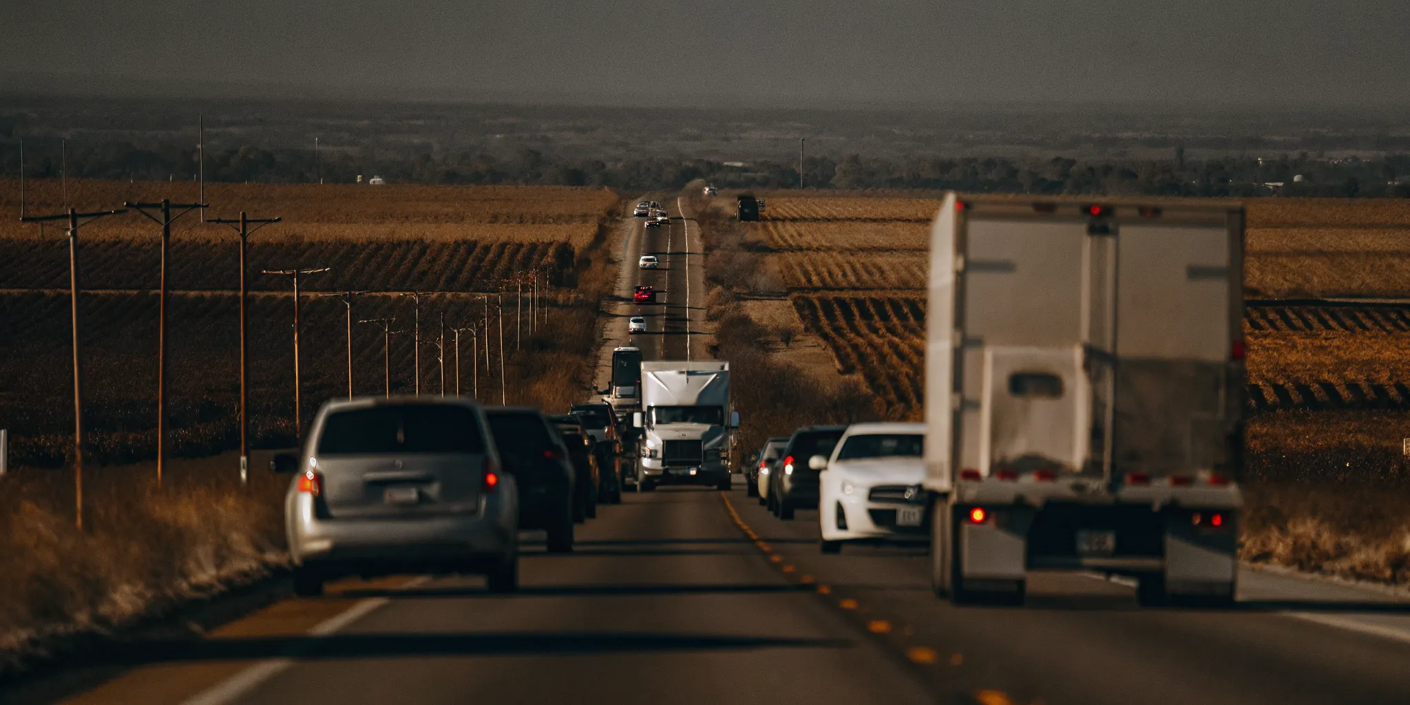 Highway 99 traffic in Modesto, California with Central Valley landscape
