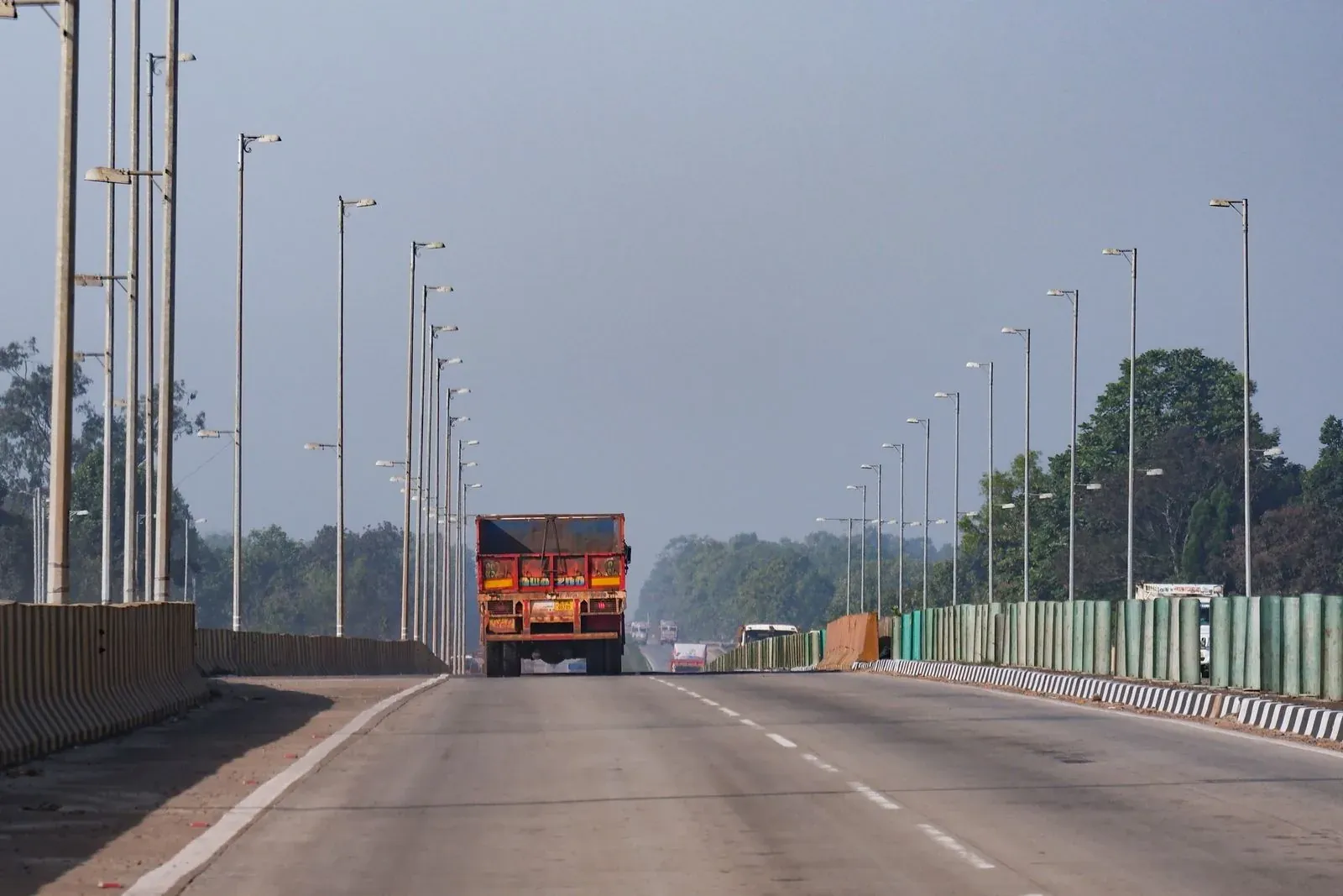 Commercial truck traveling on a divided highway, illustrating the need to preserve evidence after a fatal vehicle crash