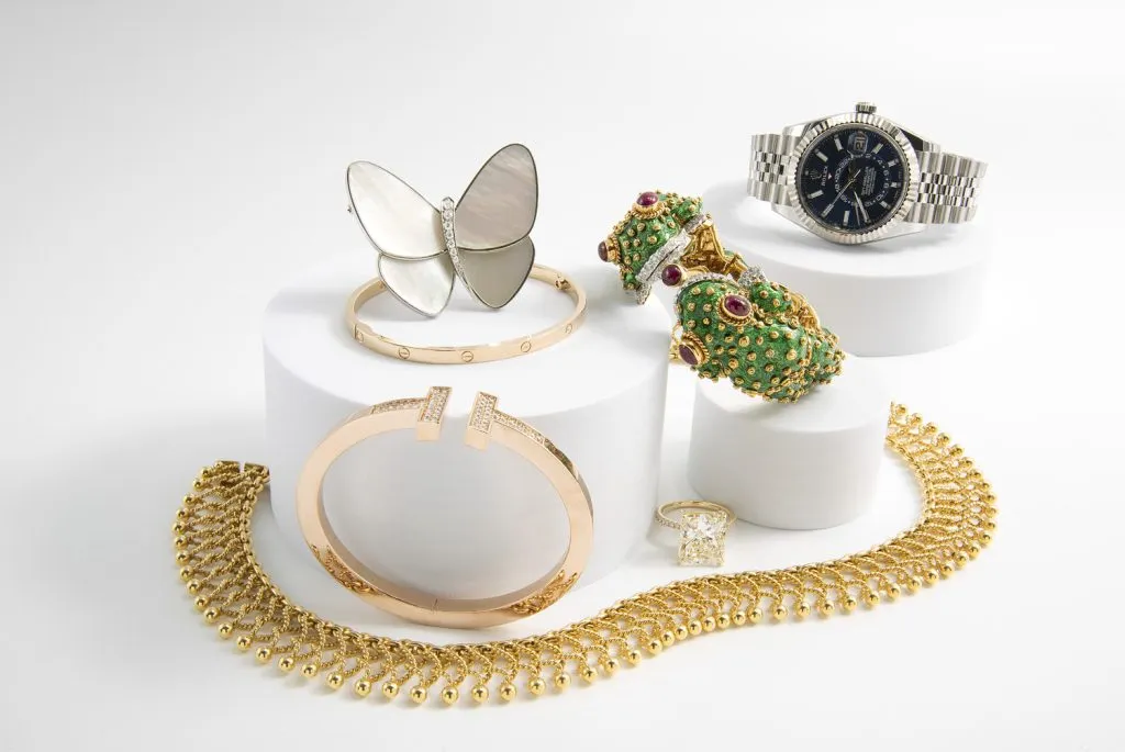 A seller preparing fine jewelry to send to Diamond Banc through its protected, insured mail-in process