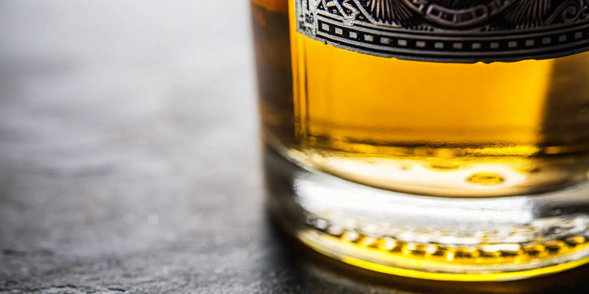 Close up of a tequila bottle label showing the NOM number