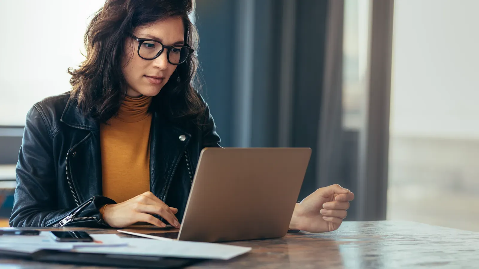 Business owner reviewing government contract financing options