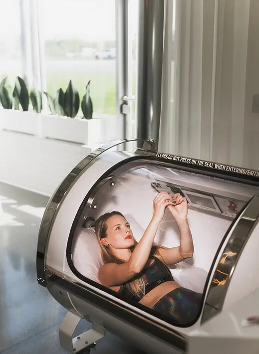 Hard-shell hyperbaric oxygen chamber used for recovery sessions