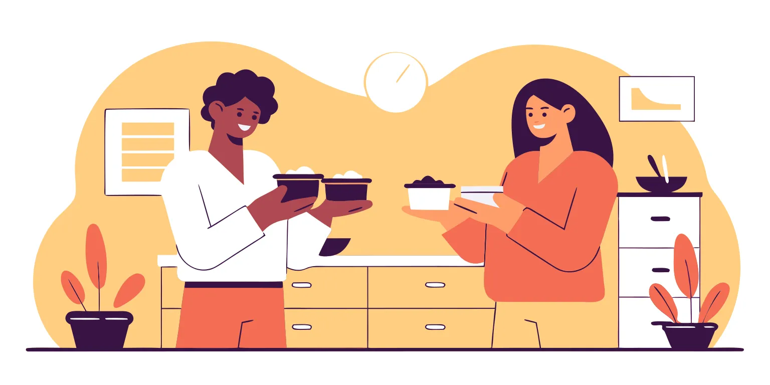 Two colleagues choosing individually labeled boxed catering meals at a catered office lunch