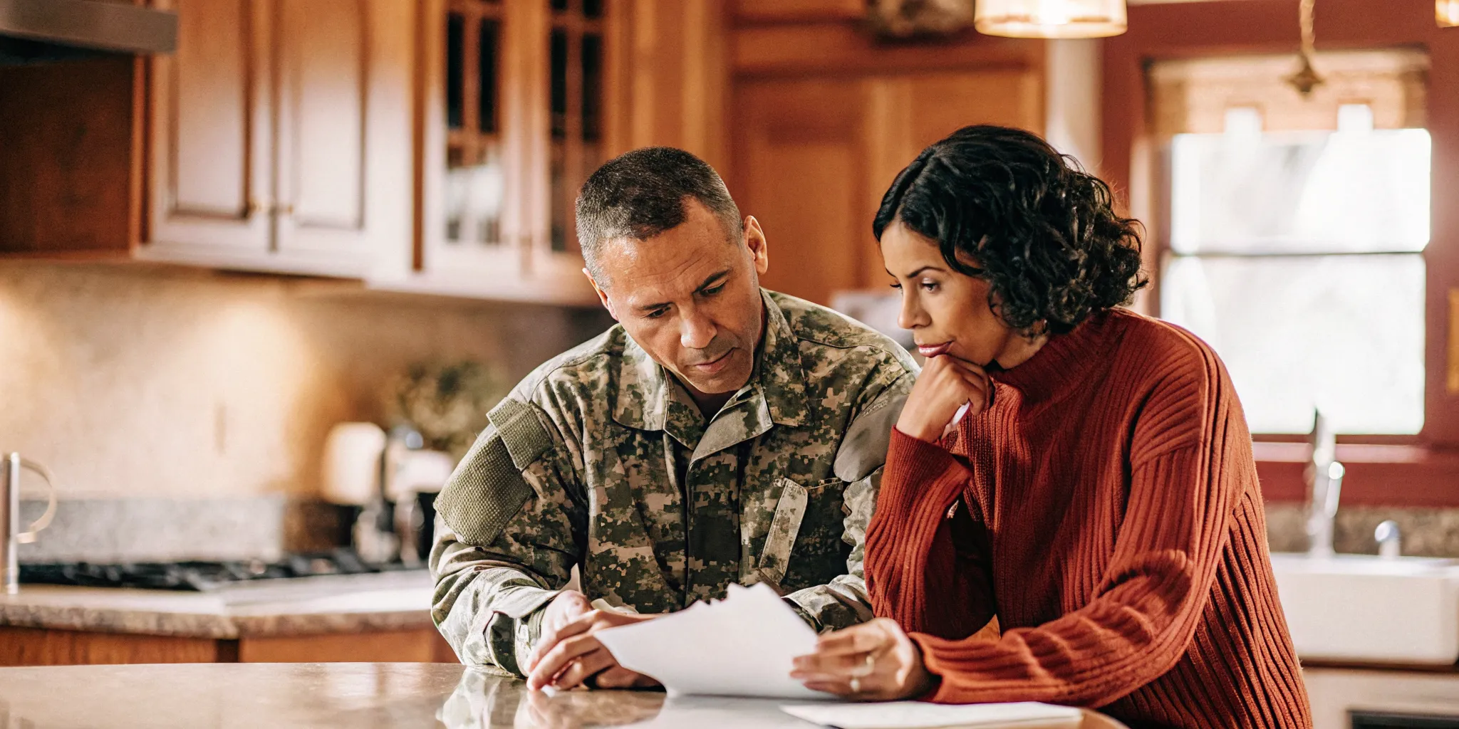 Eligible veteran reviewing total mortgage costs