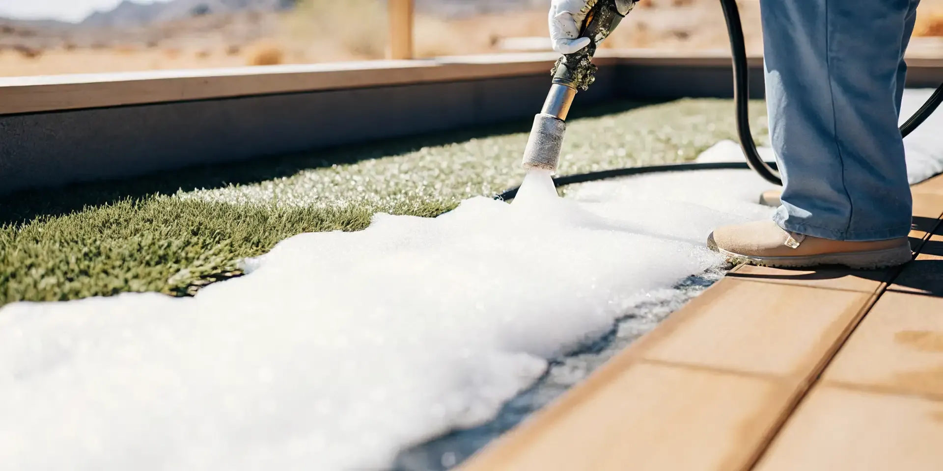 Professional enzyme deodorizing treatment applied to artificial grass turf in Las Vegas