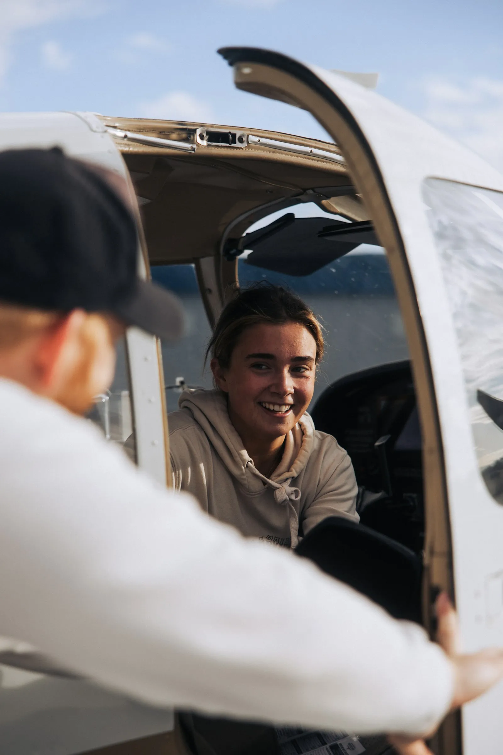 International student pilot preparing for M-1 visa flight training USA in a cockpit