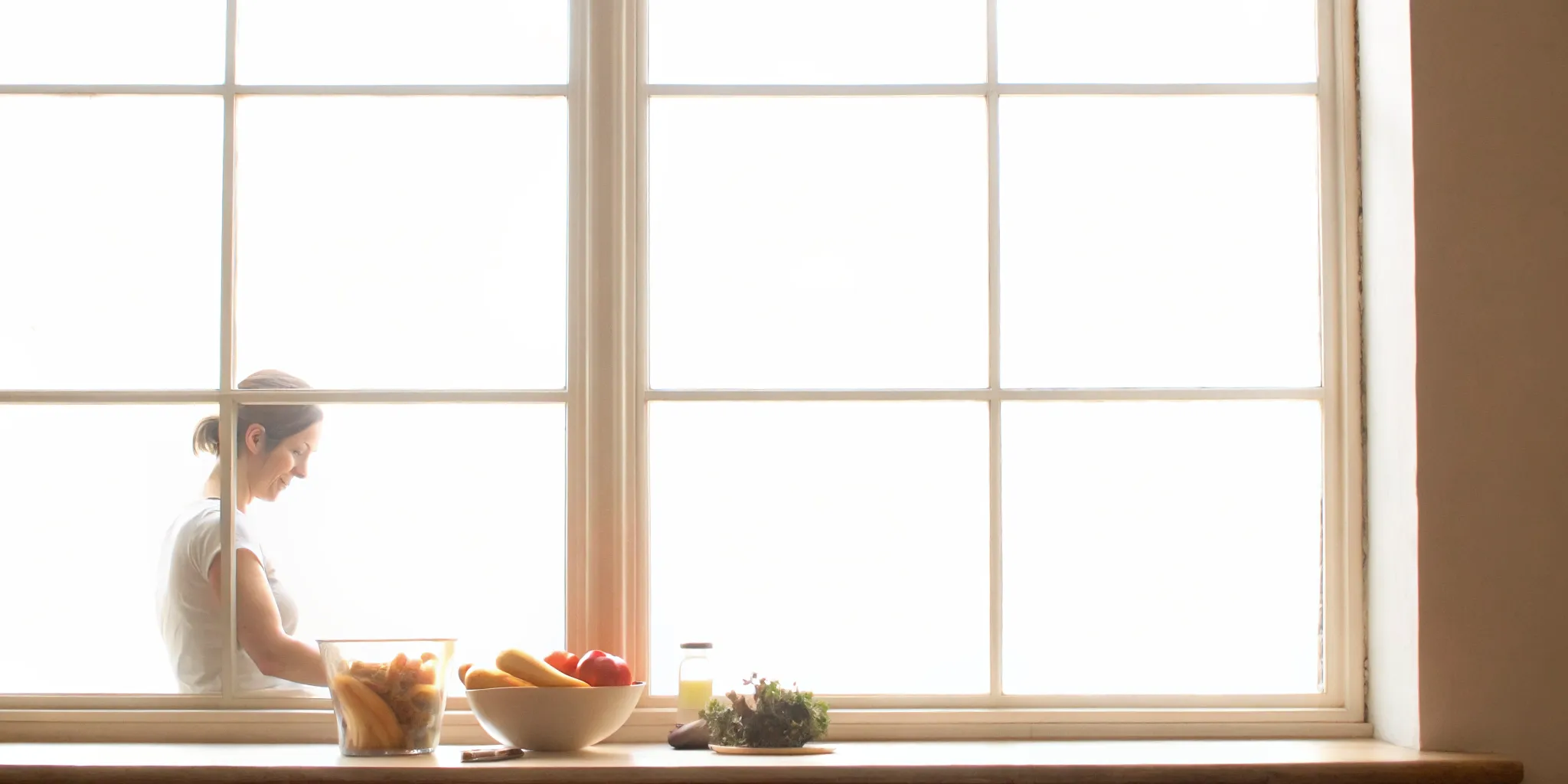 Woman preparing whole foods as part of a gut-brain wellness routine