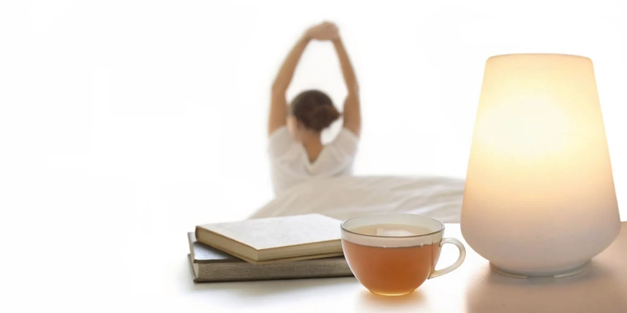 Woman stretching during a calming evening wellness routine