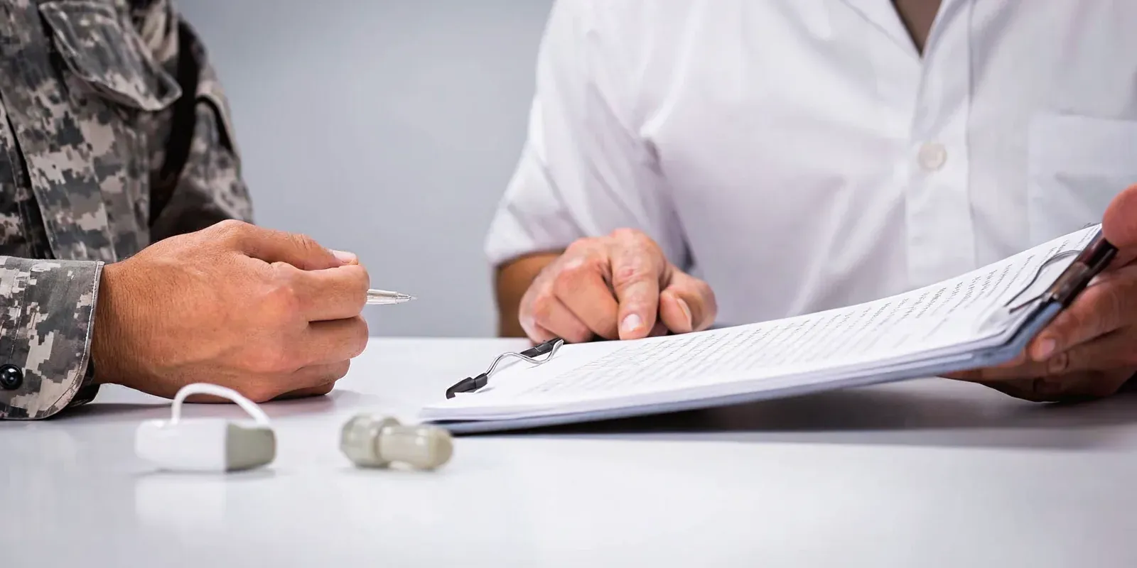 Veteran reviewing evidence after a VA tinnitus claim denied decision