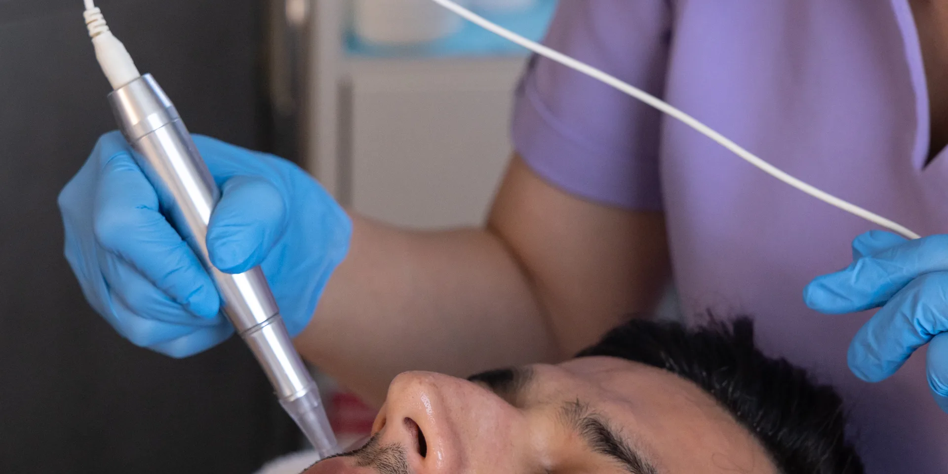 Provider discussing personalized acne scar treatment planning