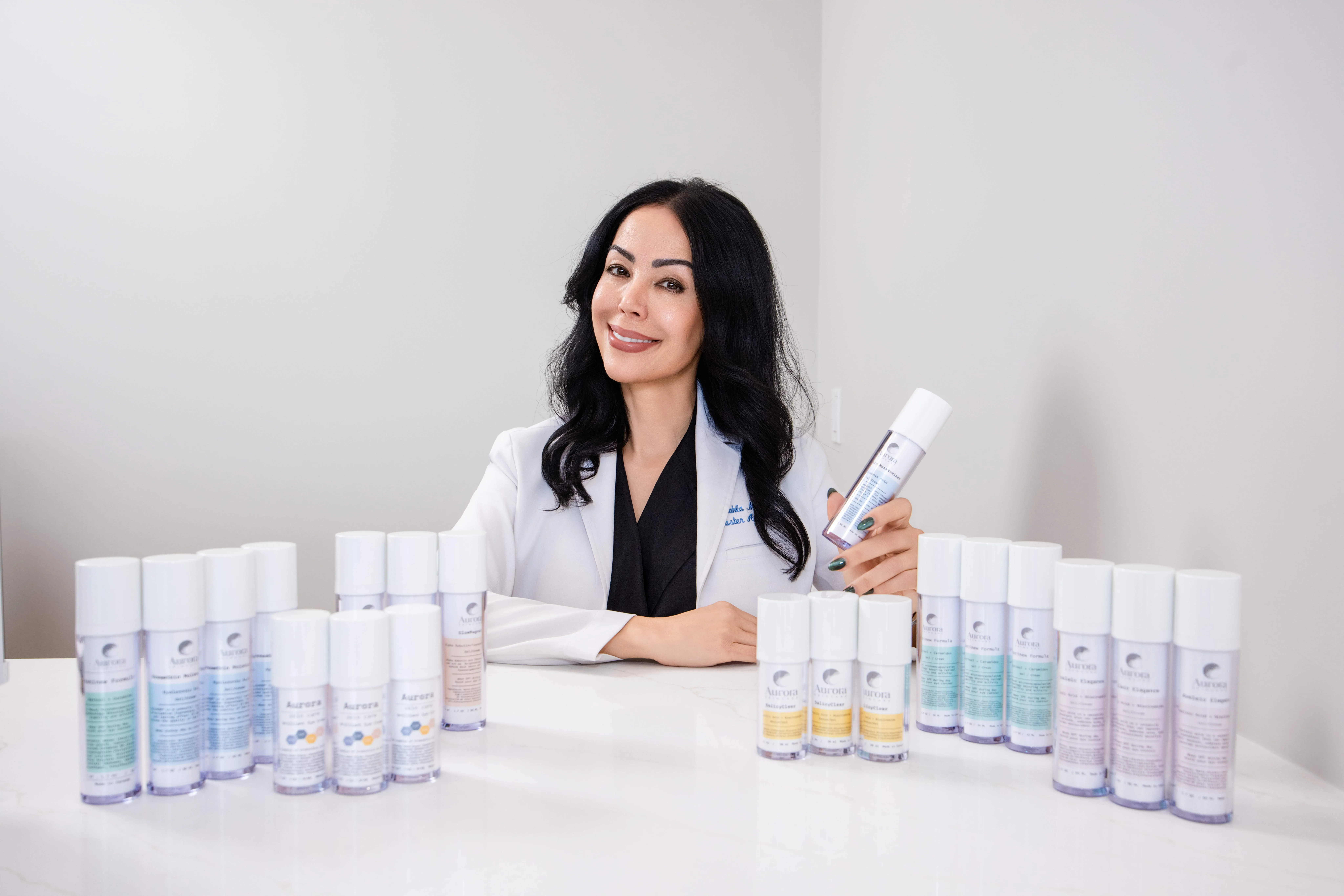 OCSC skincare products displayed in a warm clinic setting