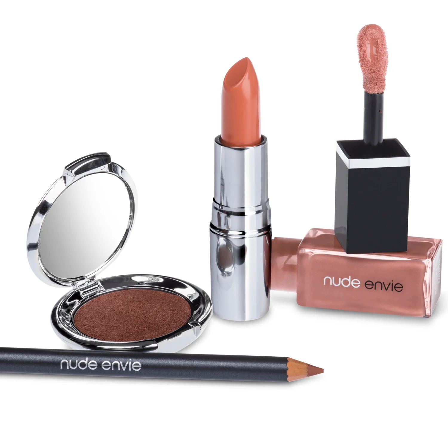 Coordinated nude lip, liner, eyeshadow, and gloss collection arranged in warm neutral tones for a complete luxury makeup gift
